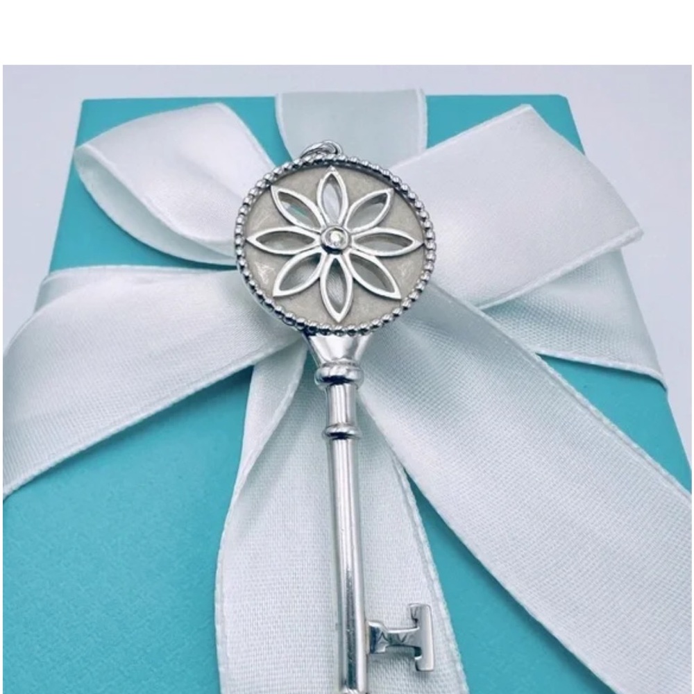 Tiffany & CO. Silver and Dimond Daisy Key Pendant with Beaded Design